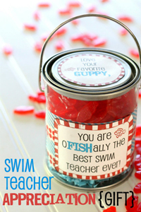Bucket full of swedish fish with nice message for swim teacher