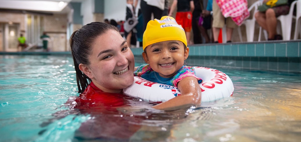 Young child attending a swimming class