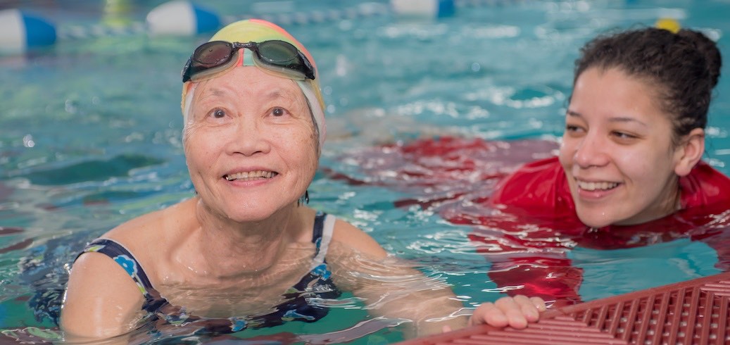 Student participating in an adult learn to swim program