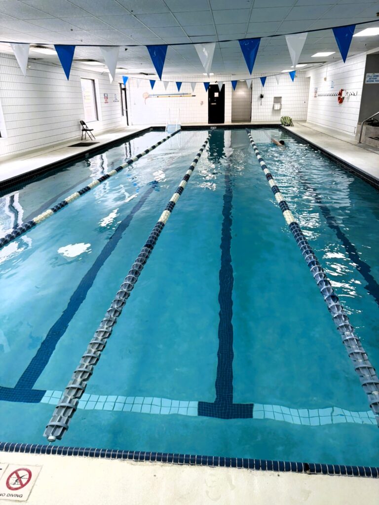 Indoor swimming pool at Crunch Fitness - North Colorado Springs used for British Swim School swim lessons, featuring lap lanes, heated water, and a clean family-friendly environment for year-round swimming classes in Colorado Springs, Colorado.