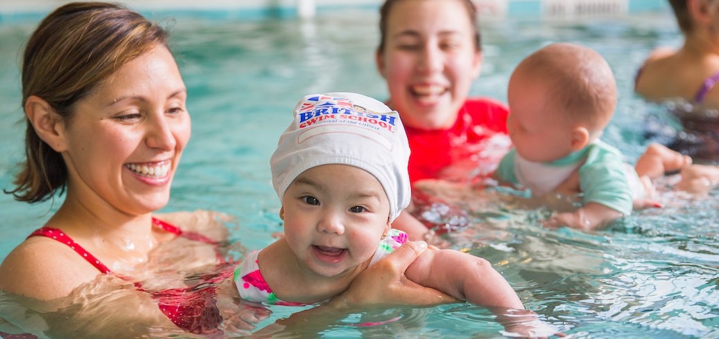 Parent and child during an infant swimming lesson