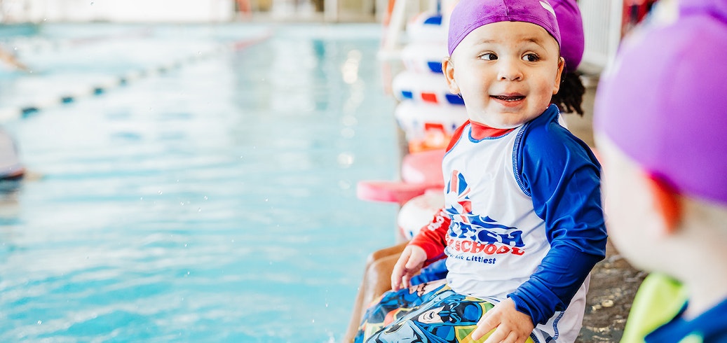 Child participating in a baby swimming class