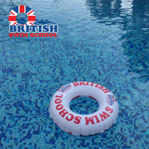 British Swim School pool ring floating in a swimming pool