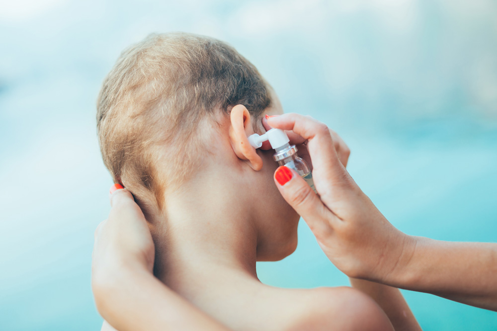 Young boy being treated for an ear infection