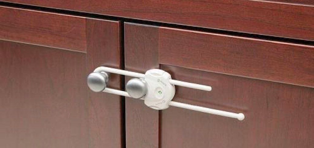 Child-proof lock on cabinet door