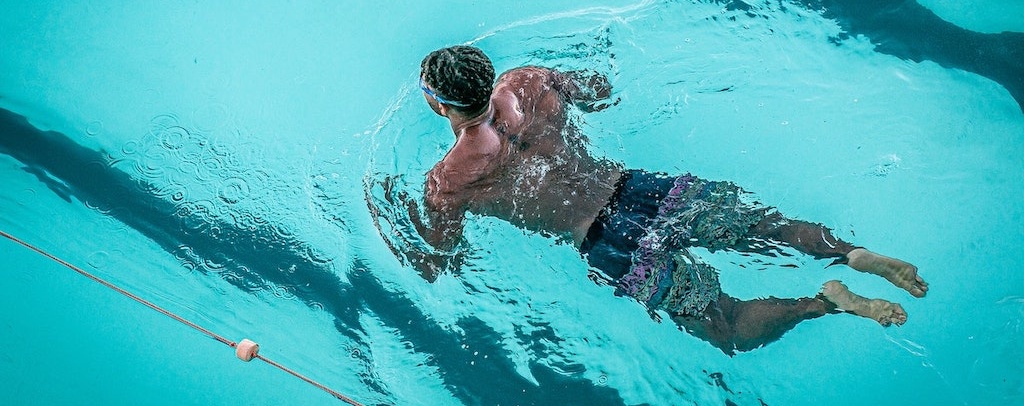 Adult swimming in a pool