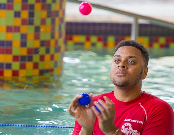 Chad in the water with water-safe balls