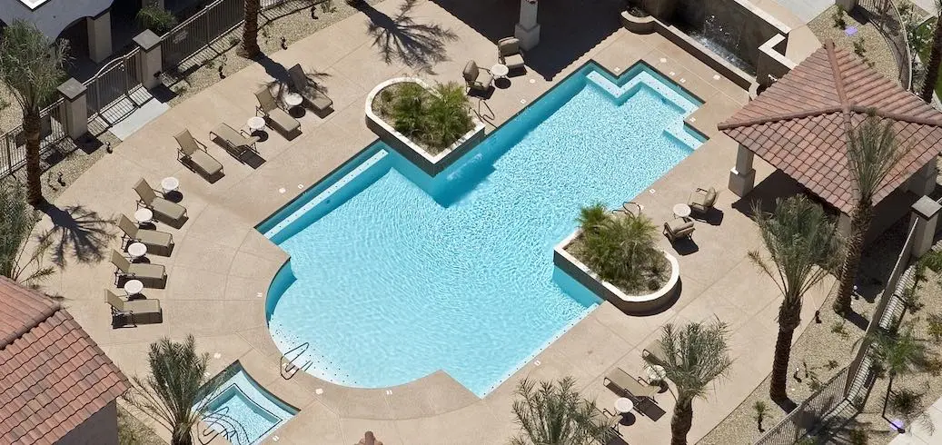 Backyard swimming pool with safety barriers